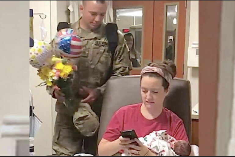 Wife texts deployed husband about their preemie twins, unbeknownst to her he’s standing right behind her