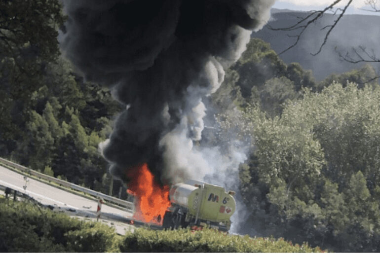 After accidentally killing his wife in a collision, husband runs to the burning tanker and lies down in the flames