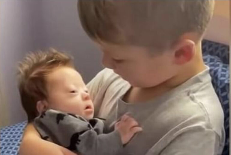 Boy Sings To Infant Brother And Says “Aren’t We All Different