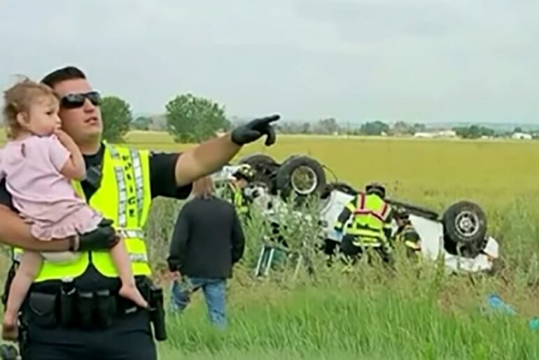 Dad dies in car crash, so police officer comforts his distraught daughter by singing